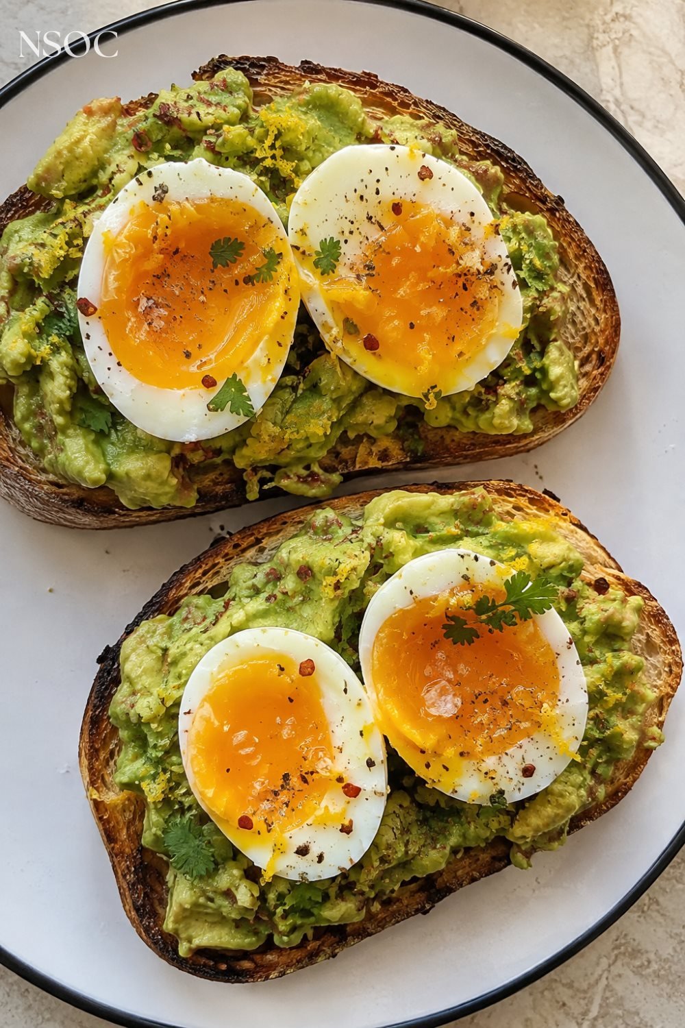 Vertical Pinterest pin of avocado toast with jammy eggs