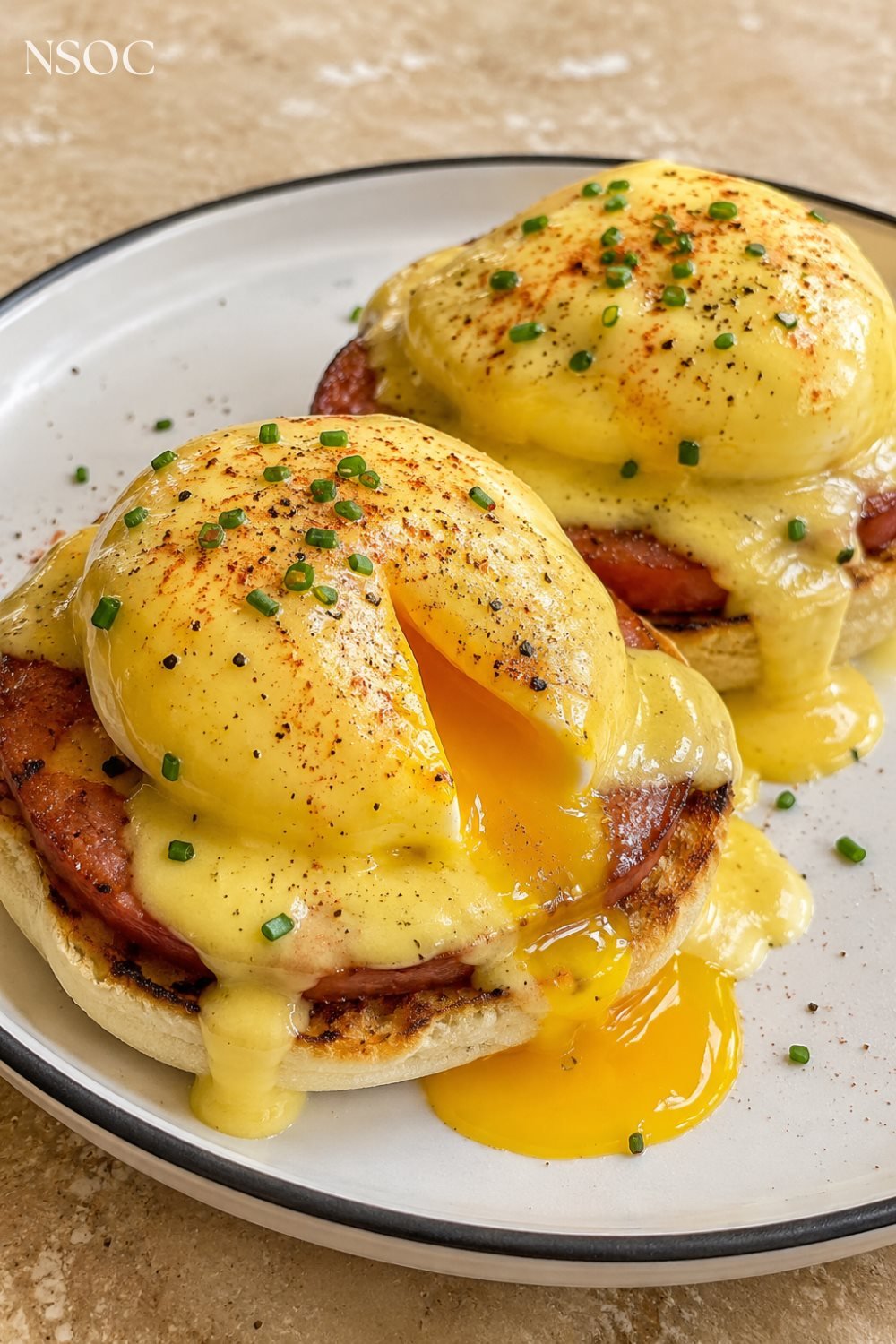 Vertical Pinterest pin of eggs benedict for a weekend breakfast