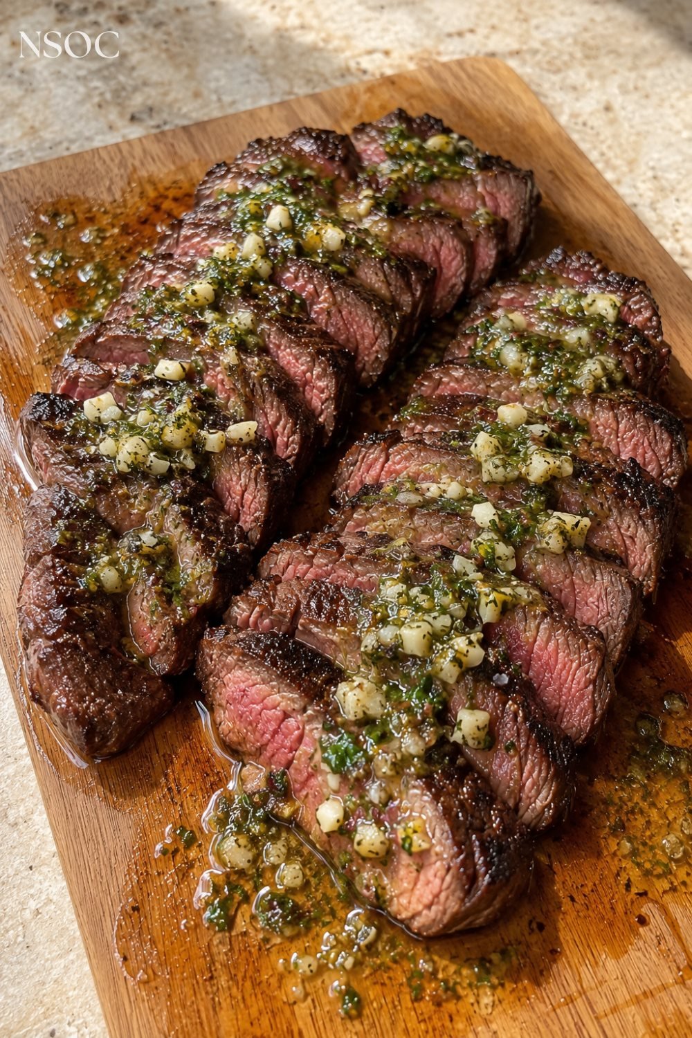 Vertical Pinterest pin of a garlic butter sirloin steak, an example of NSOC campaign food photography