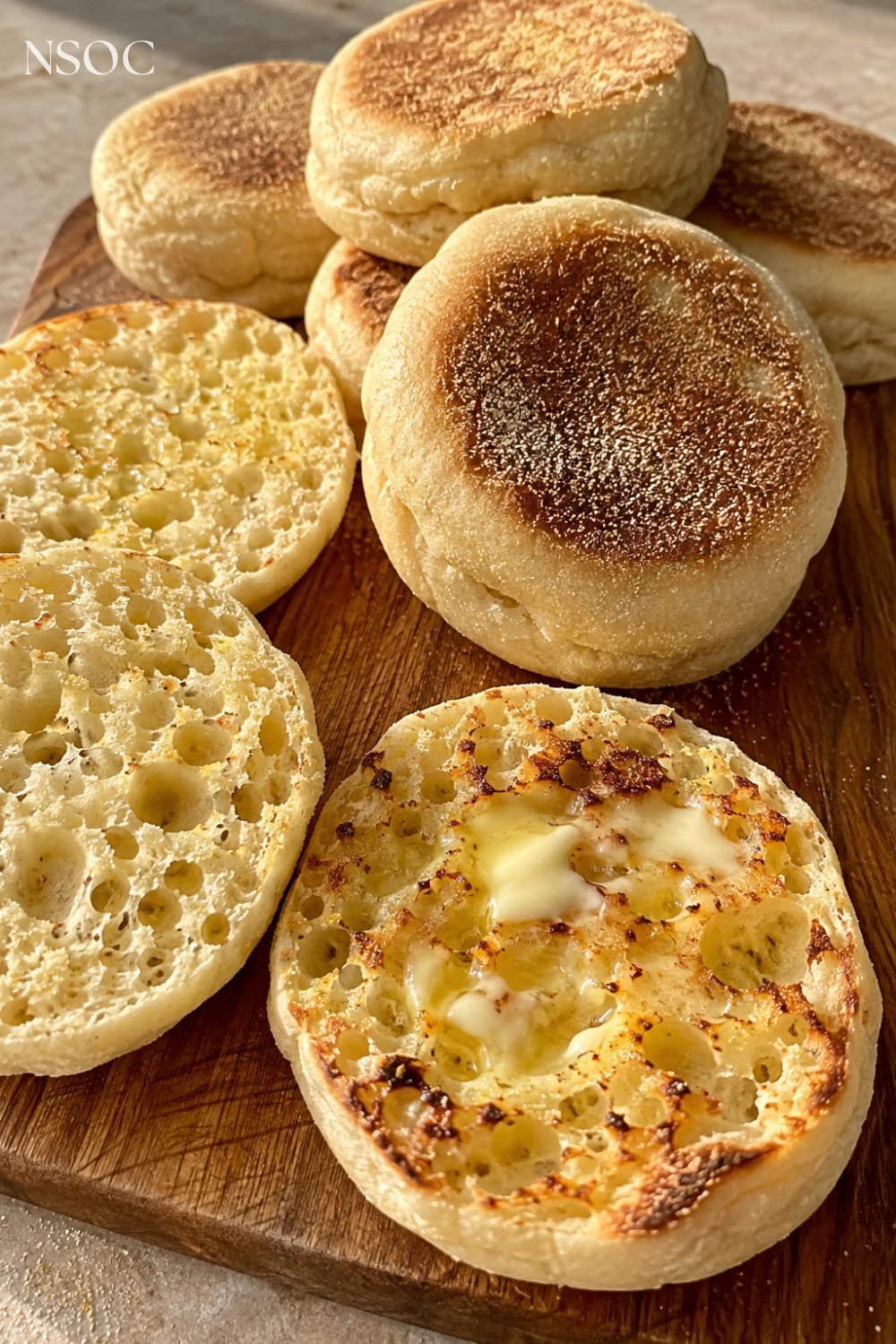 Vertical Pinterest pin of homemade English muffins, an example of NSOC campaign food photography