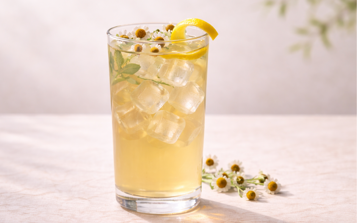 chamomile honey white iced tea served over ice with dried chamomile and lemon peel