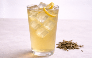 classic iced white tea served over ice with lemon peel
