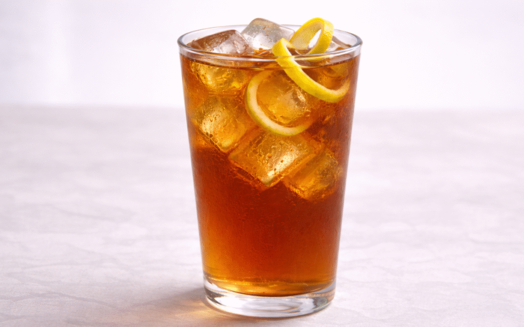 Lemon Peel Black Iced Tea (No Juice) lemon peel black iced tea served over ice with lemon peel twists