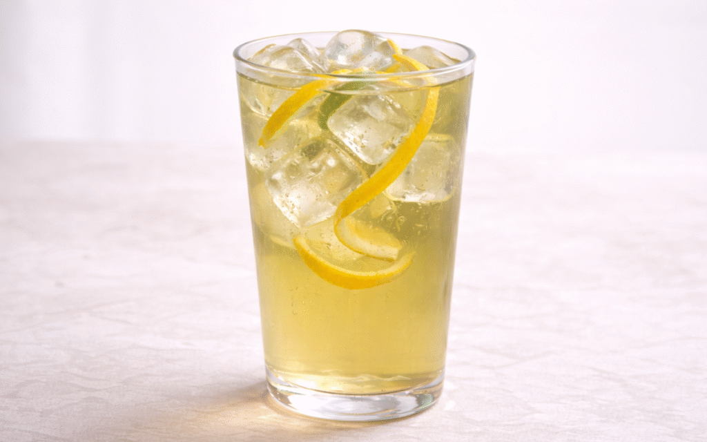 Yuzu Green Iced Tea (with Honey) yuzu green iced tea served over ice with yuzu peel twist