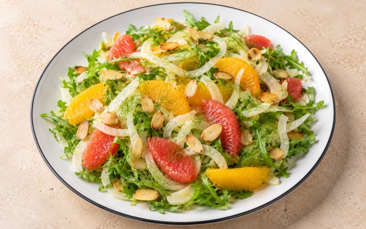 Shaved fennel citrus salad with paper-thin fennel slices, orange and grapefruit segments, and arugula